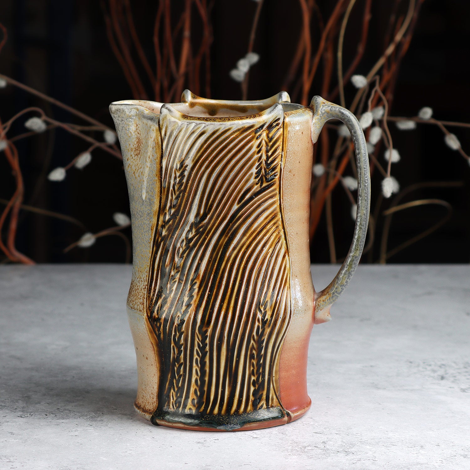 Soda Fired Carved Pitcher