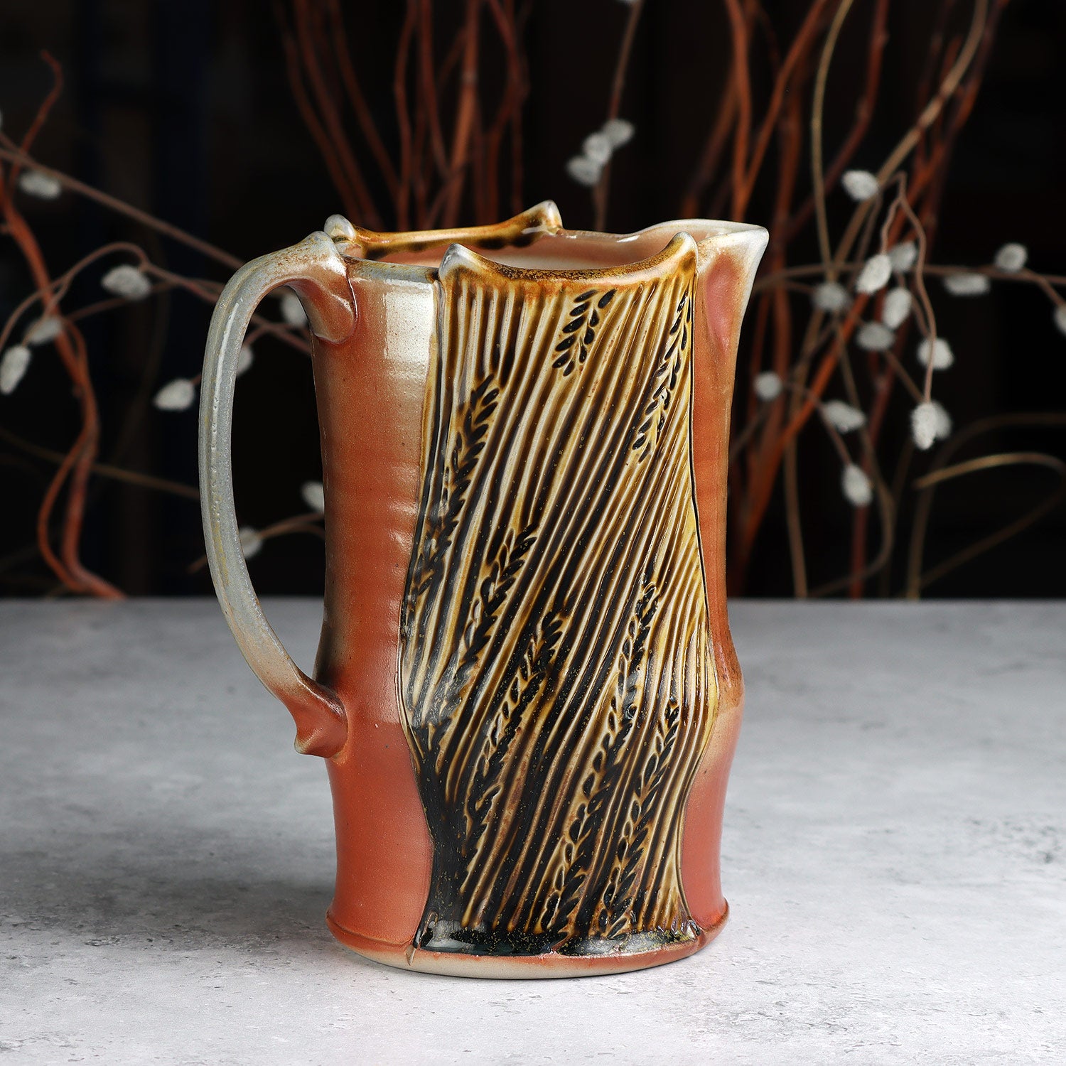 Soda Fired Carved Pitcher