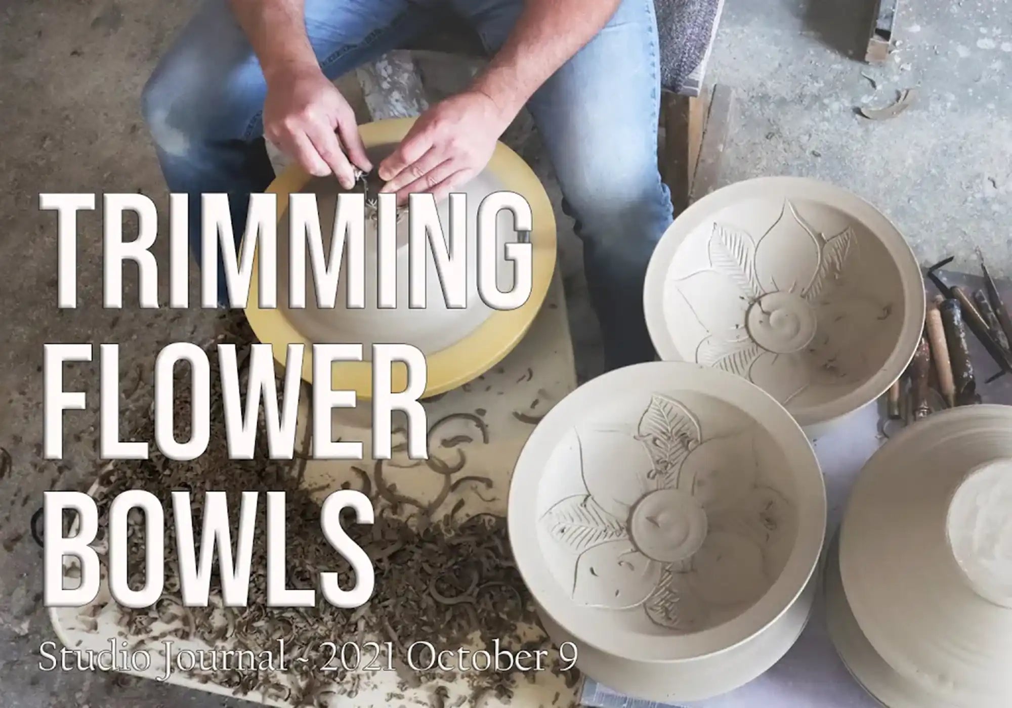 A title card image from above of a potter sitting at a potter's wheel, with soft clay bowls stacked to one side.